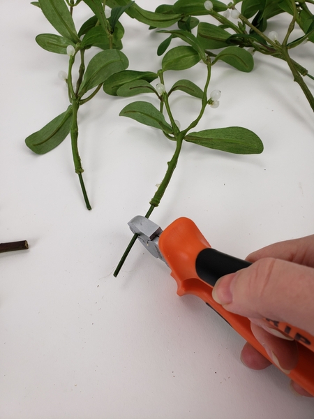 My artificial stems already had a small bit of wire on the end. My artificial stems already had a small bit of wire on the end.