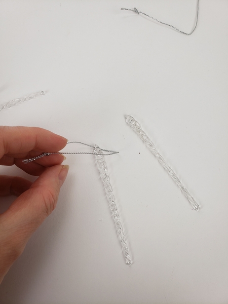 Remove the cord from glass icicle Christmas decorations Remove the cord from glass icicle Christmas decorations