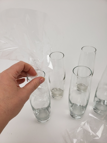 Slip the cellophane into a bud vase Slip the cellophane into a bud vase