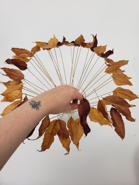 Turn the leaves so that they point out Turn the leaves so that they point out
