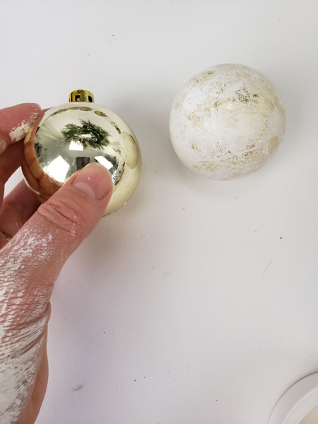 Turning a shiny, inexpensive bauble into a designer snow ball Turning a shiny, inexpensive bauble into a designer snow ball