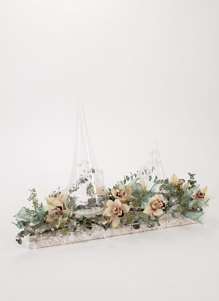 Create a floral centerpiece without using a container Create a floral centerpiece without using a container