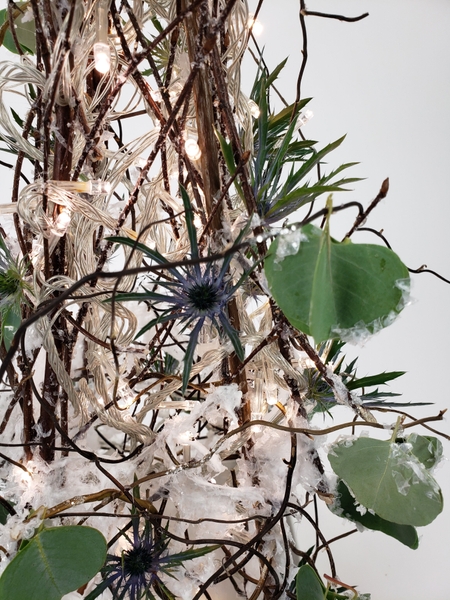 Eryngium flowers in a Christmas floral design