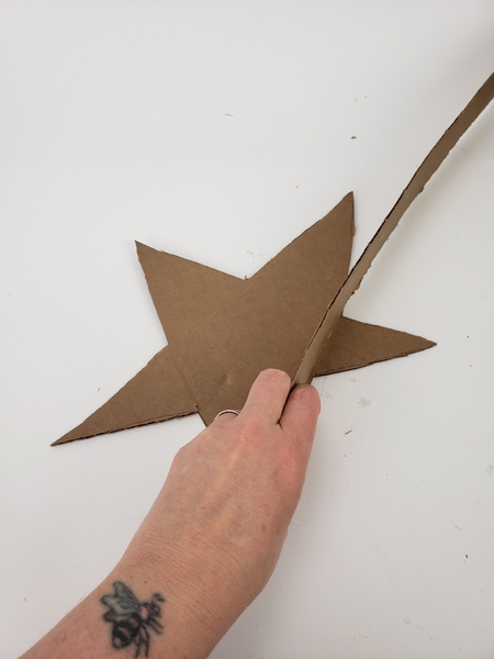 Glue the strip around the outer edge of one of the stars Glue the strip around the outer edge of one of the stars