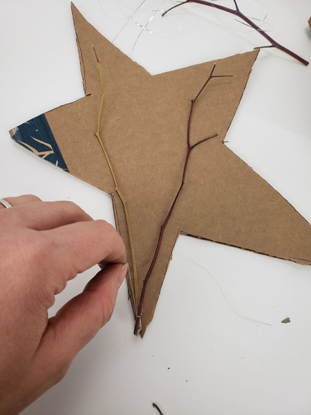 I used tinsel to tie the stems together I used tinsel to tie the stems together