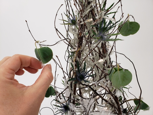 Make sure the baubles hang freely so that they can dangle and turn Make sure the baubles hang freely so that they can dangle and turn
