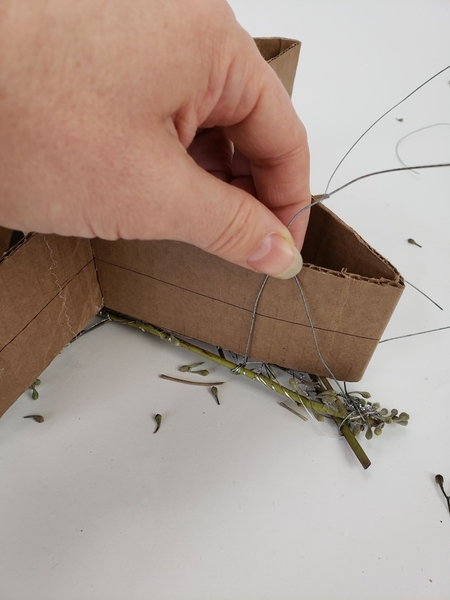 Place the cardboard star on the bottom twig star Place the cardboard star on the bottom twig star