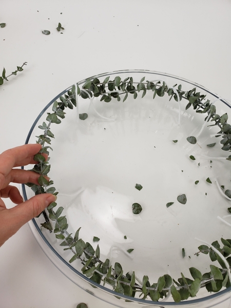 Place the wreath in a bowl to guide the shape