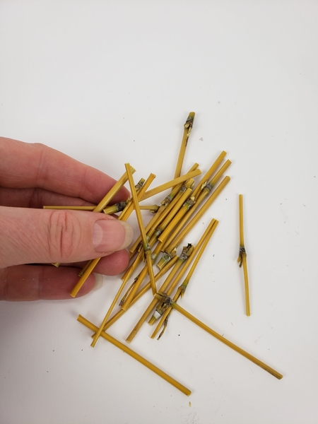 Cut a hand full of small bamboo snippets Cut a hand full of small bamboo snippets