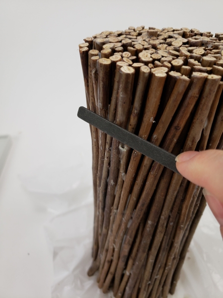 Clean away any visible blobs of glue with a file Clean away any visible blobs of glue with a file