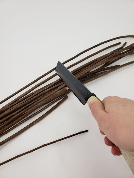 Cut a generous bundle of straight twigs Cut a generous bundle of straight twigs