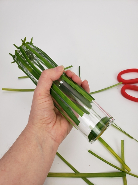 Cut the grass shorter so that it fits in the vase Cut the grass shorter so that it fits in the vase