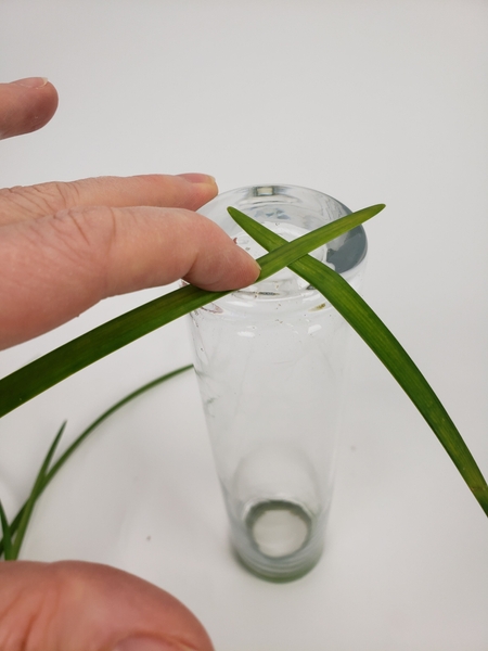 For the first few blades use a tiny bit of floral glue to secure the grass For the first few blades use a tiny bit of floral glue to secure the grass
