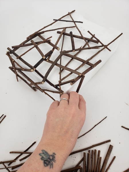 Once the shape is filled in with twigs move on to the sides Once the shape is filled in with twigs move on to the sides