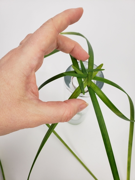 Start to weave in grass