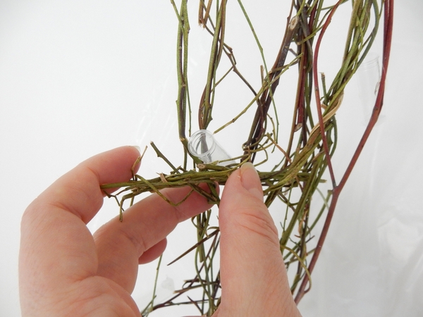 Add in tiny water tubes to keep your flowers hydrated