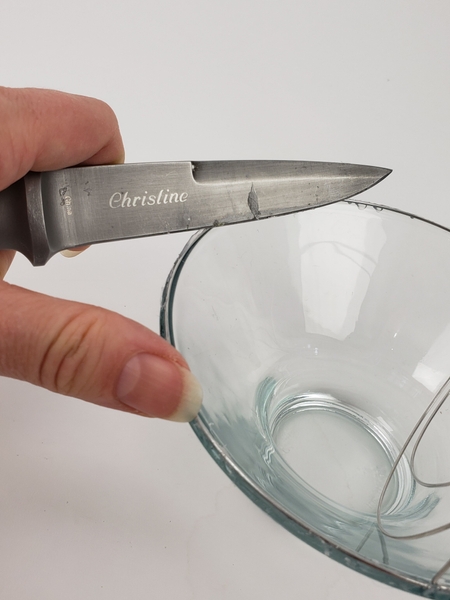 Cut away any visible glue with a sharp knife Cut away any visible glue with a sharp knife