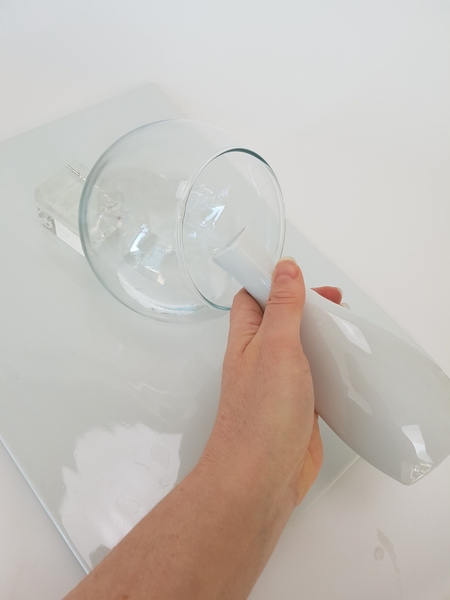 Fill the fishbowl vase with water Fill the fishbowl vase with water
