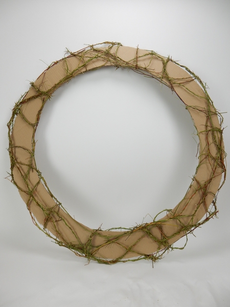 Once the entire cardboard is linked with eucalyptus stems set it aside to dry Once the entire cardboard is linked with eucalyptus stems set it aside to dry