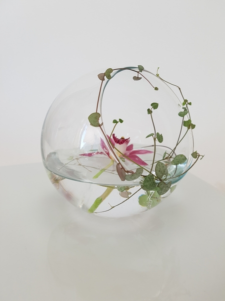 Turn your familiar vase into something new by balancing it on it's side Turn your familiar vase into something new by balancing it on it's side