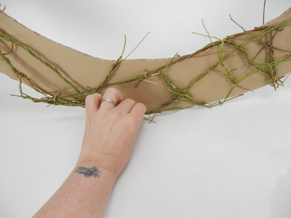 You are going to remove the cardboard so make sure the knots are secure You are going to remove the cardboard so make sure the knots are secure