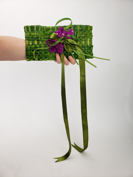 A clutch purse floral design by Christine de Beer A clutch purse floral design by Christine de Beer