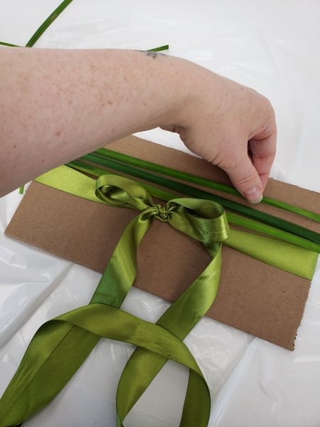 Add more bands of grass above the ribbon Add more bands of grass above the ribbon