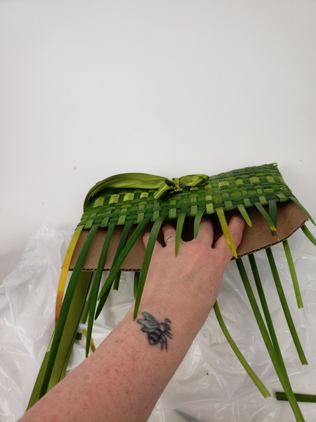 Bend the cardboard slightly at the middle so that it pulls out without damaging your bag Bend the cardboard slightly at the middle so that it pulls out without damaging your bag