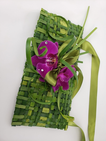 Lily grass and orchids floral design handbag