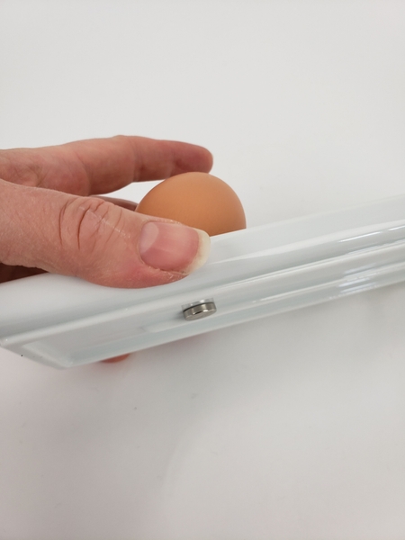 Slip another magnet below the egg to keep it securely in place Slip another magnet below the egg to keep it securely in place