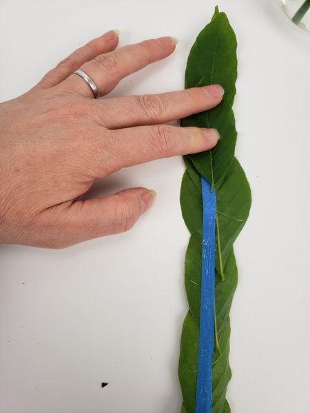 Before flipping it over to cover the over side of the tape Before flipping it over to cover the over side of the tape