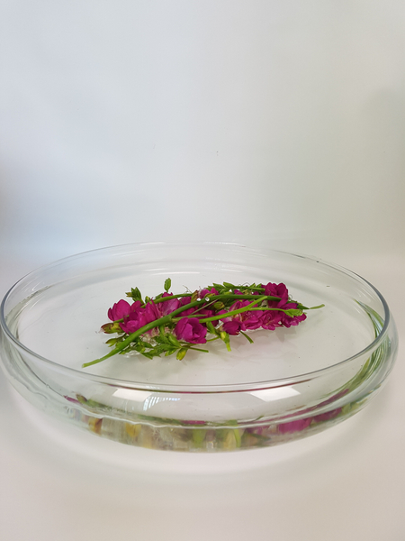 Make a flower arrangement that floats on water