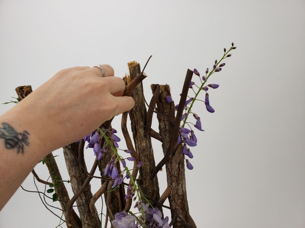 Place the flowers in the tubes so that is remains hydrated and fresh for as long as possible Place the flowers in the tubes so that is remains hydrated and fresh for as long as possible