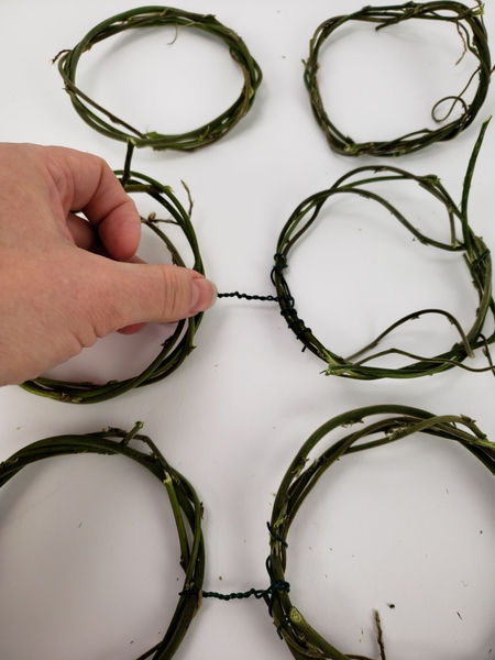 Connect the next set of wreaths