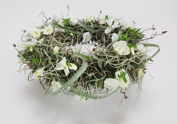 Craft an eucalyptus lei to create a table top wreath Craft an eucalyptus lei to create a table top wreath