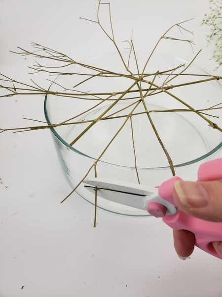 Cut away the stems sticking out over the edge Cut away the stems sticking out over the edge