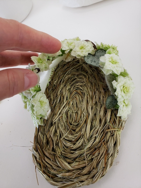 Make sure all the flowers are on the outside of the ribbon Make sure all the flowers are on the outside of the ribbon