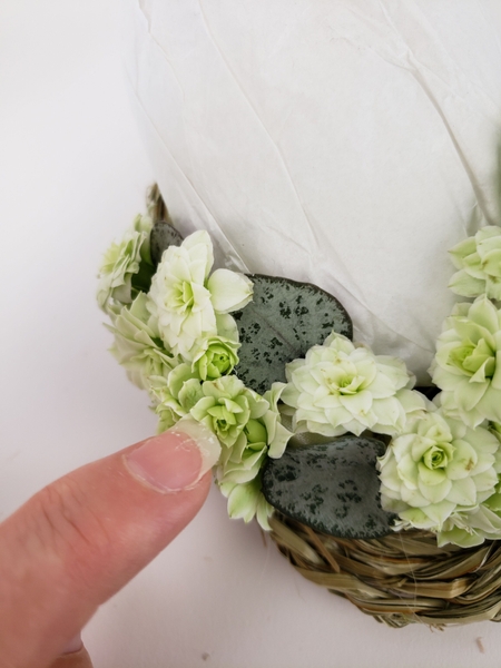 That neatly slips in between the open flowers That neatly slips in between the open flowers