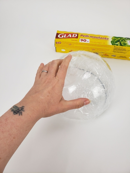 Cover a bowl with cling wrap Cover a bowl with cling wrap