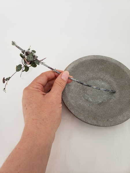 Make sure the bud vase is secure before adding water or design details Make sure the bud vase is secure before adding water or design details
