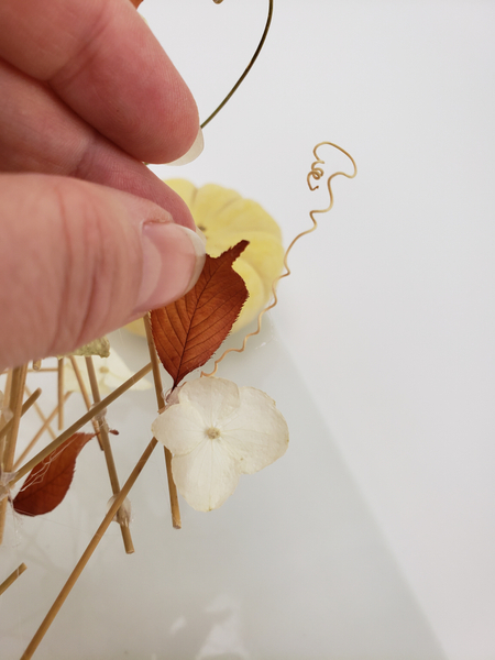 Reshape and glue in a few autumn leaves