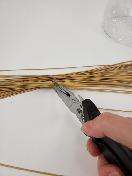 Snip a reed bundle into sections