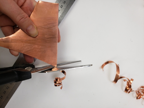 Cut the left over copper into thin strips